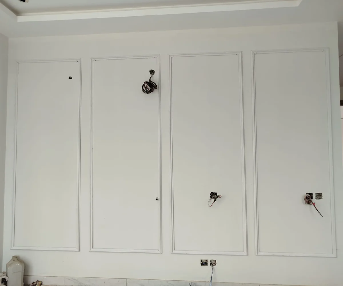 French wall moulding design installed in a Karachi living room by Identity Interior