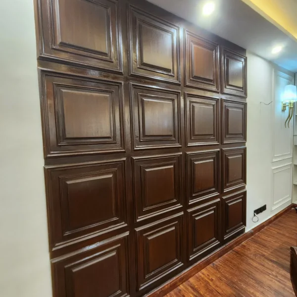 Decorative wooden wall paneling installed at Custom House Karachi office by Identity Interior